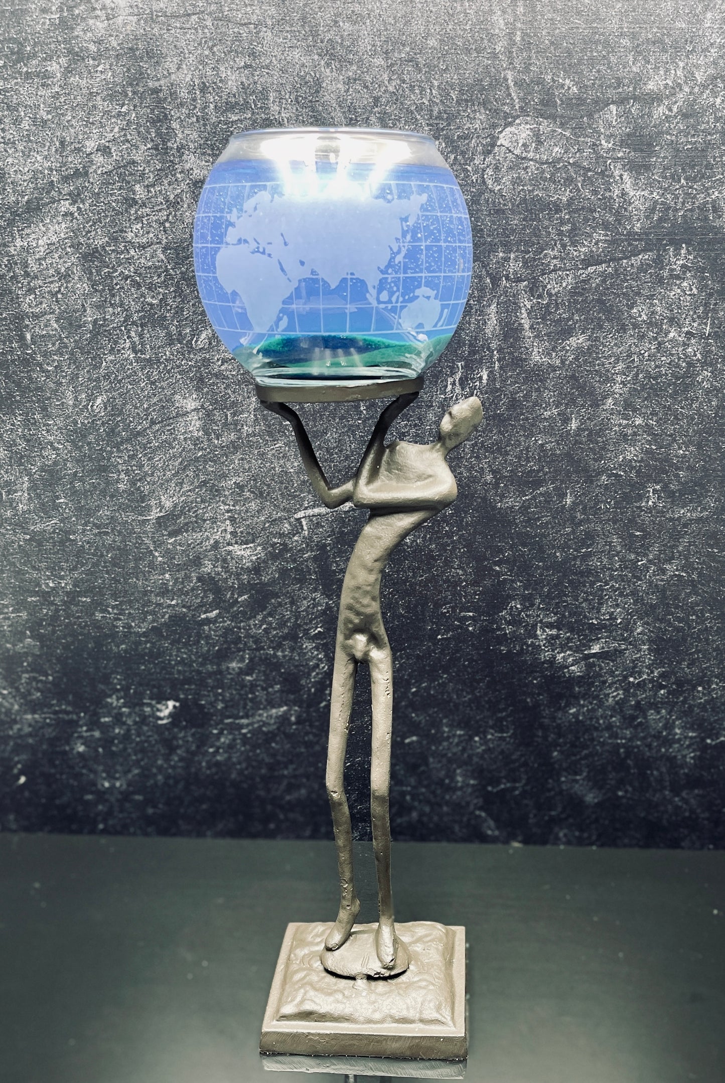 Carrying the World on His Shoulders